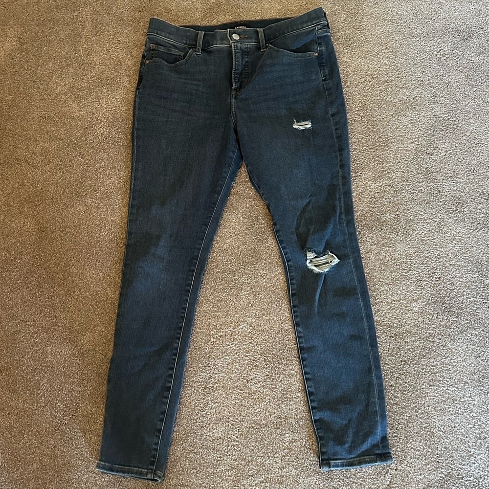 Express Jeans. Size 8R . Skinny mid-rise and lightly distressed.